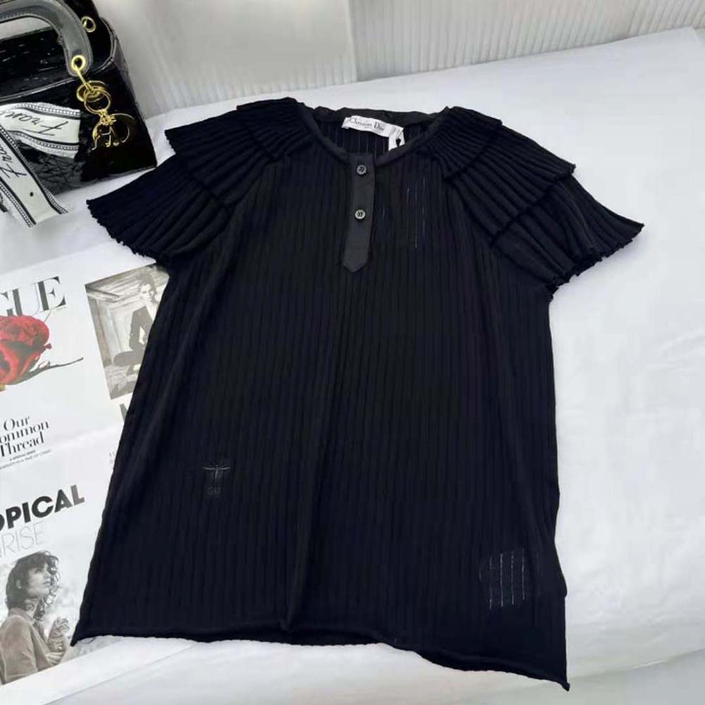 Close-up of black linen knit fabric and frilled trim on Dior Women Frilled Top