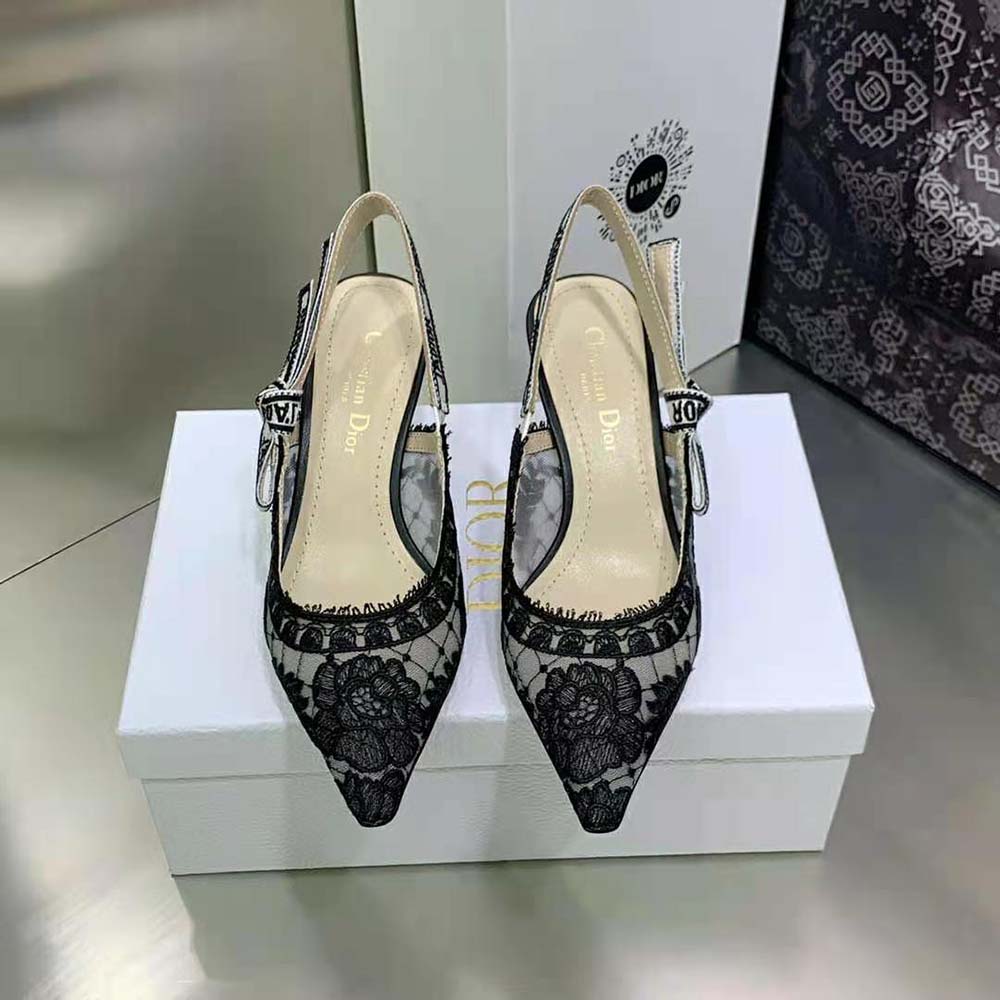 Close-up of black transparent mesh and Dior rose motif detail