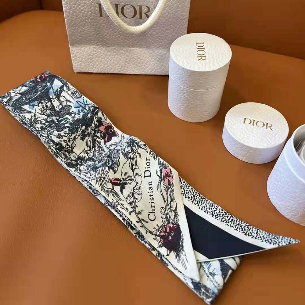 Close-up detail of the multicolor Jardin Magique print on Dior scarf
