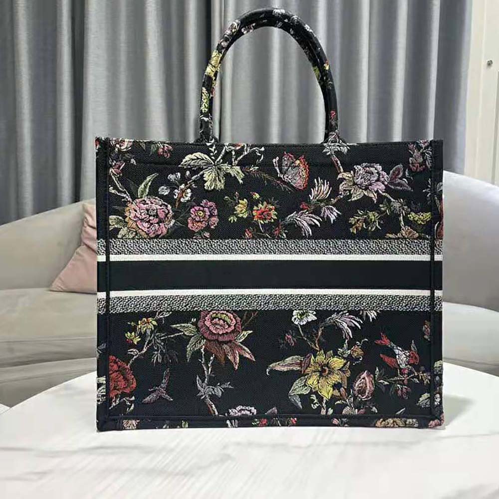 Side angle showing zip-top closure and silhouette of Dior Women Large Dior Book Tote