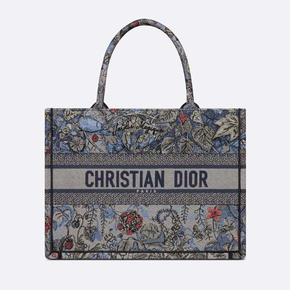 Front view of Dior Women Medium Dior Book Tote Denim Multicolor Dior Jardin Magique Embroidery with embroidery detail