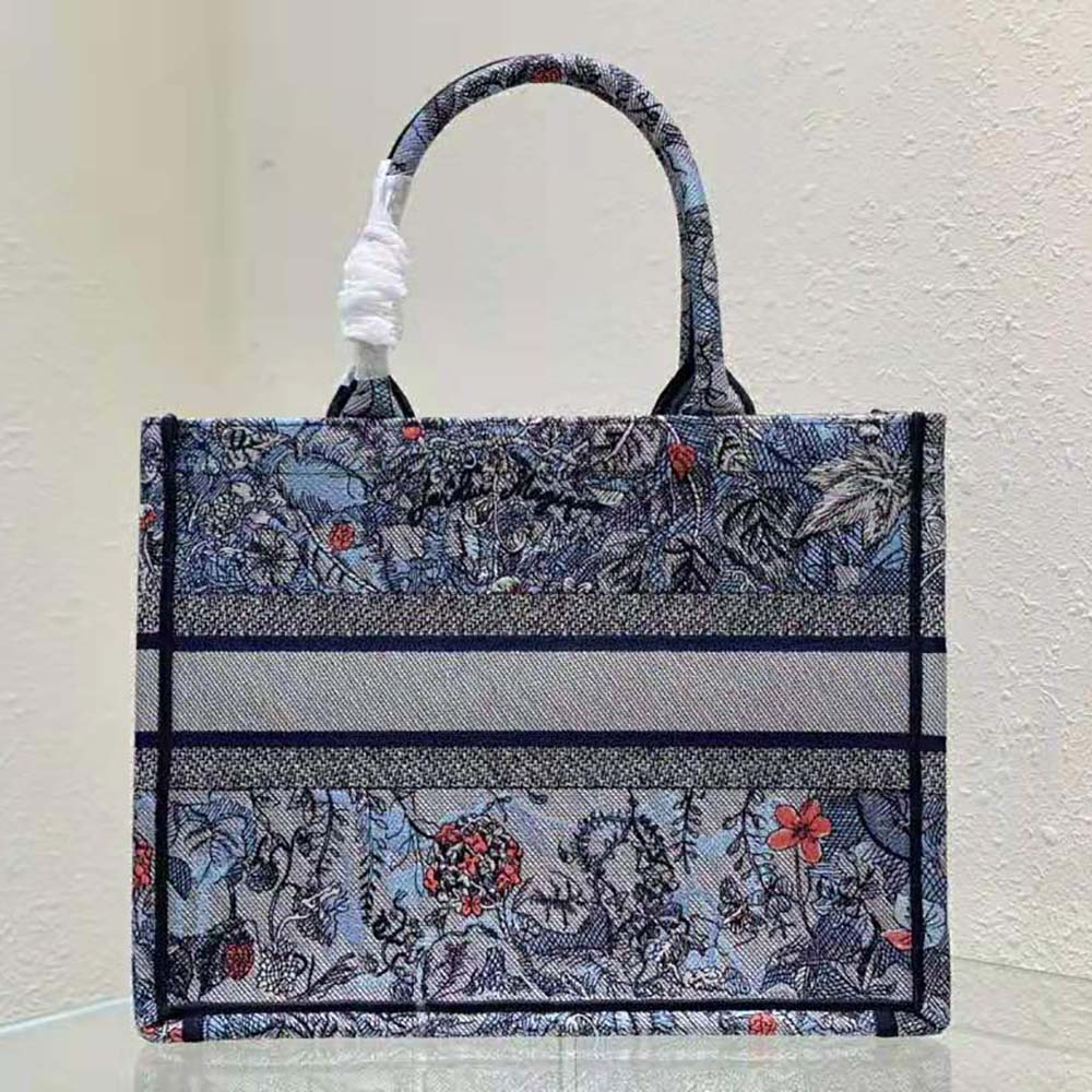 Side angle showing silhouette and silver hardware on Dior Women Medium Dior Book Tote