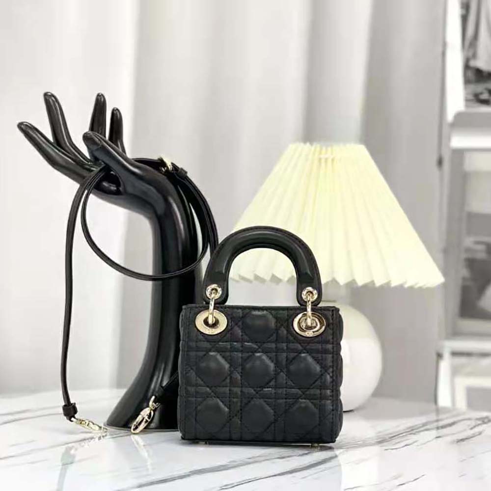 Side profile showing silver hardware and compact size of Dior Women Micro Lady Dior Bag