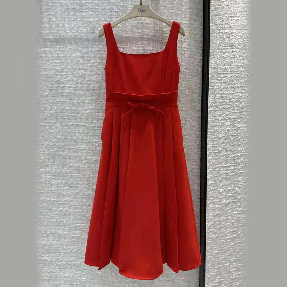 Close-up detail of red wool and silk shantung fabric on Dior dress