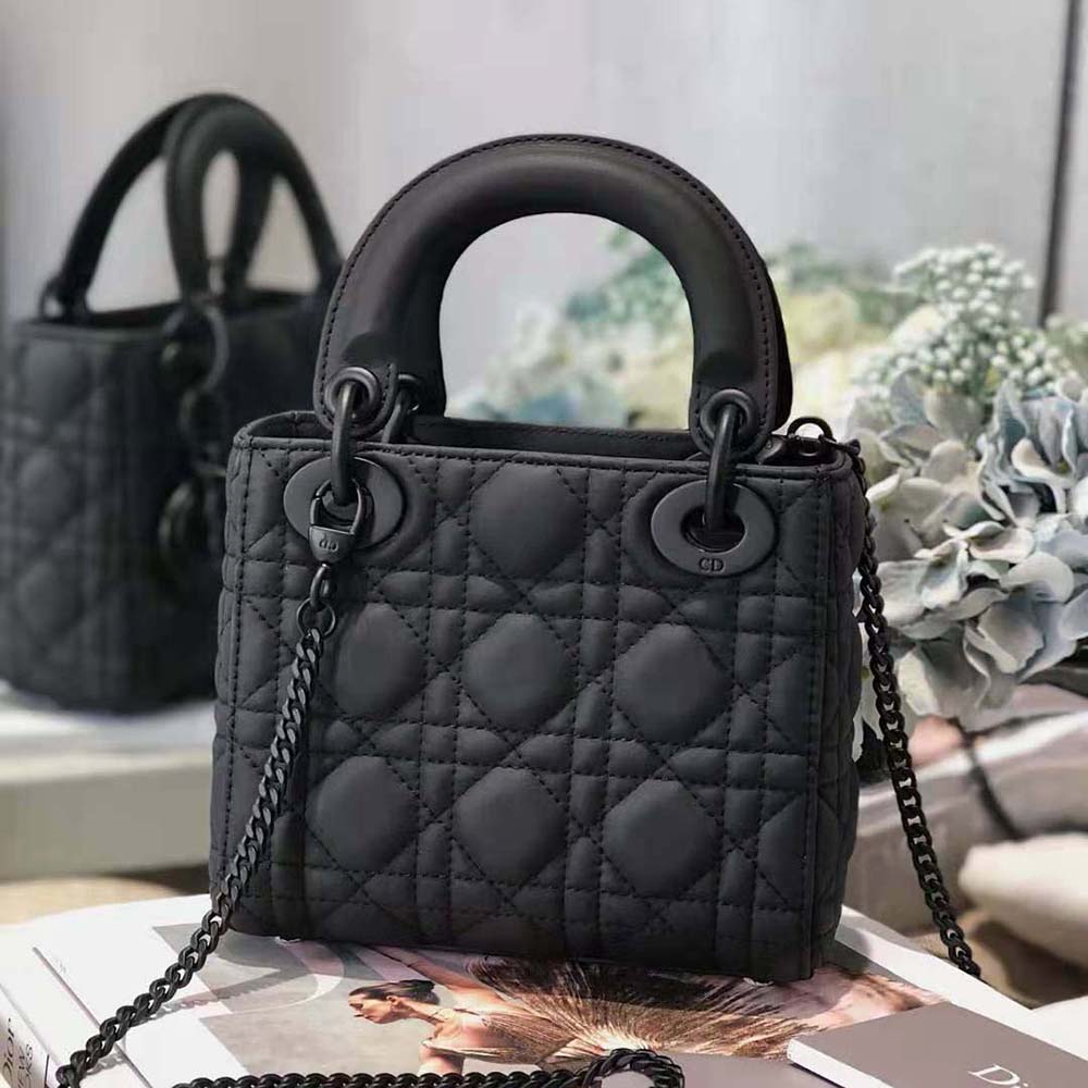 Side view showing flap closure of Dior Women Mini Lady Dior Bag Black Ultramatte