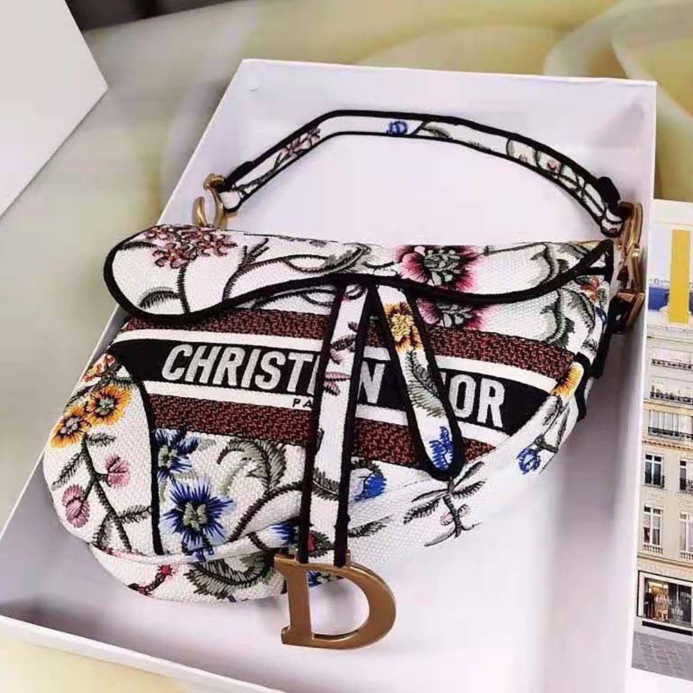 Side profile with gold hardware details on Dior Women Saddle Bag White Multicolor Dior Petites Fleurs Embroidery