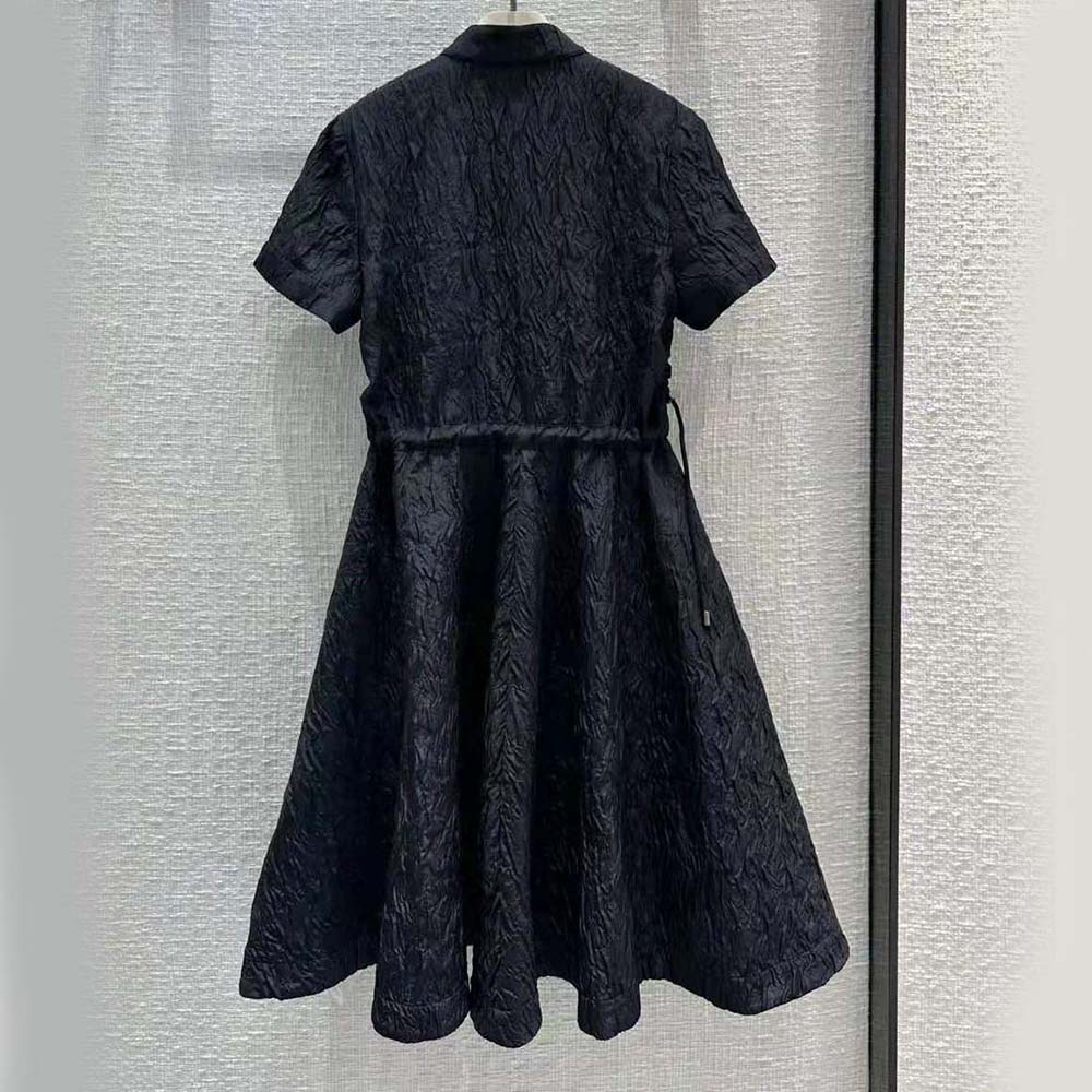 Side profile showing flared silhouette of Dior Women Short Flared Dress