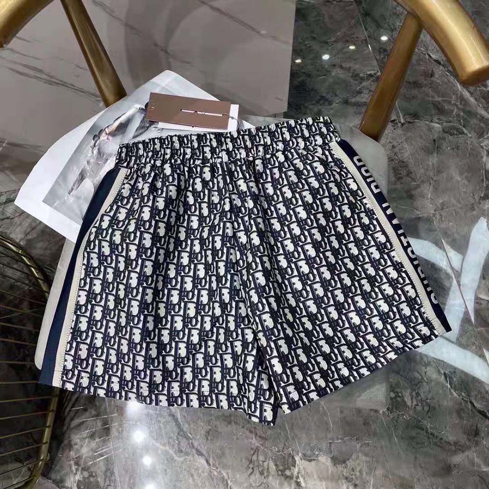 Side angle showing silhouette of Dior Women Shorts Blue Technical Taffeta Jacquard