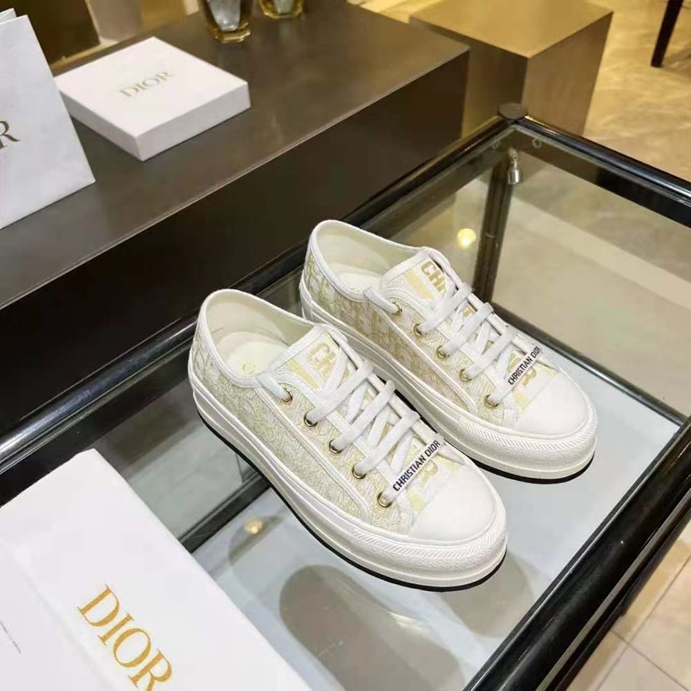 Top angle showing platform sole and cotton metallic thread texture