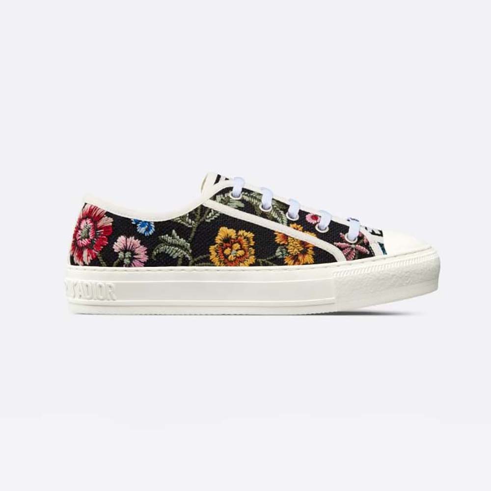 Side profile of Dior Women Walk’N’Dior Sneaker in black with floral embroidery