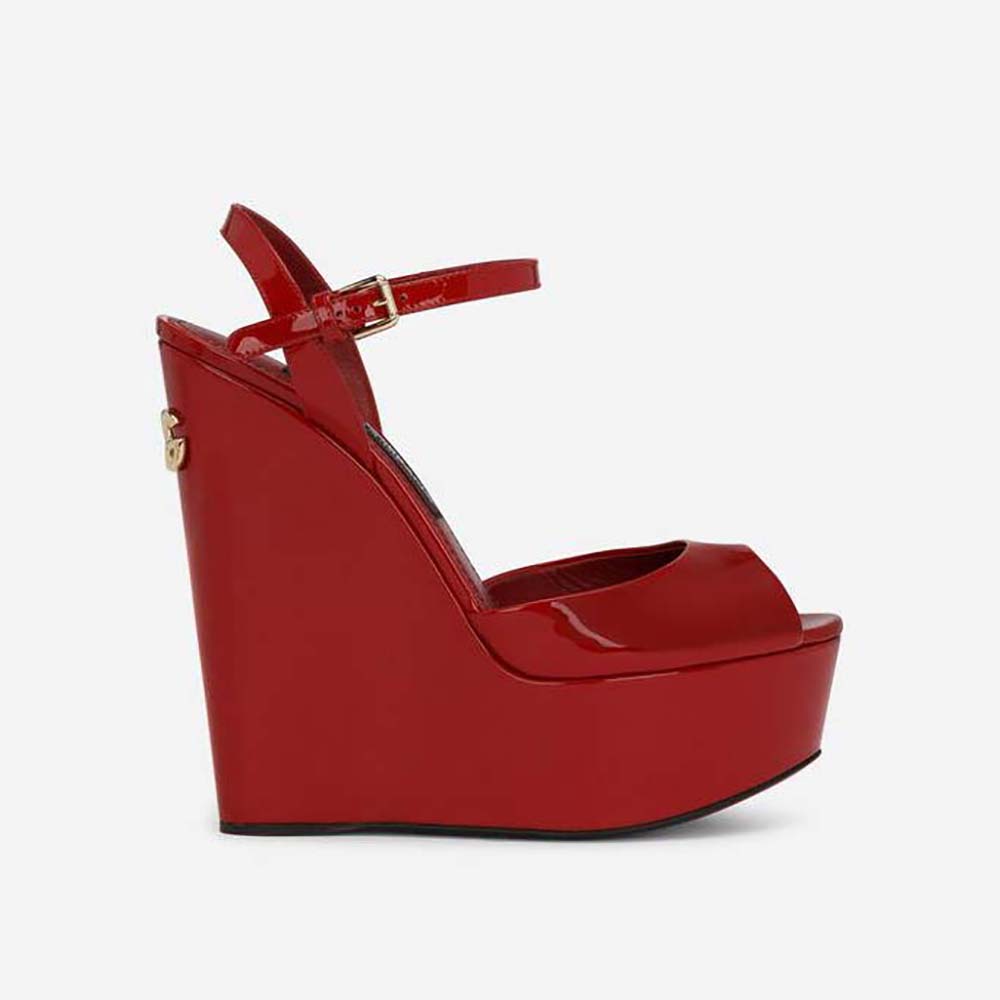 Side angle of Dolce Gabbana D&G Women Patent Leather Wedges-Red showing glossy finish
