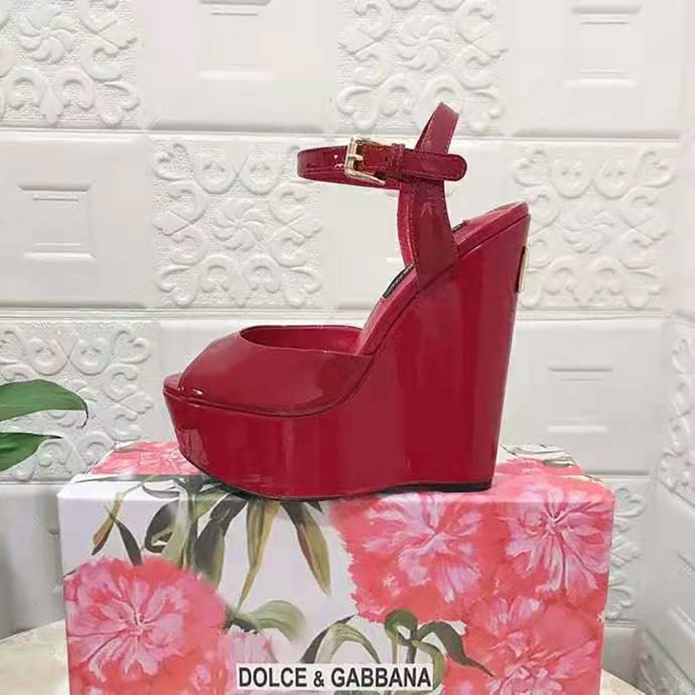 Close-up of buckle and signature hardware on Dolce Gabbana D&G Women Patent Leather Wedges-Red