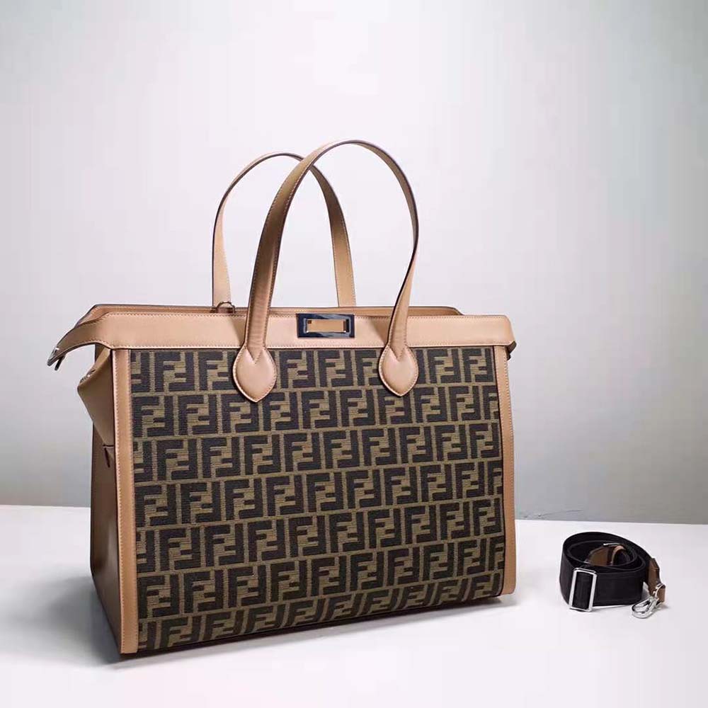 Side profile showing structured silhouette of Fendi Men Peekaboo ISeeU Forty8 Bag