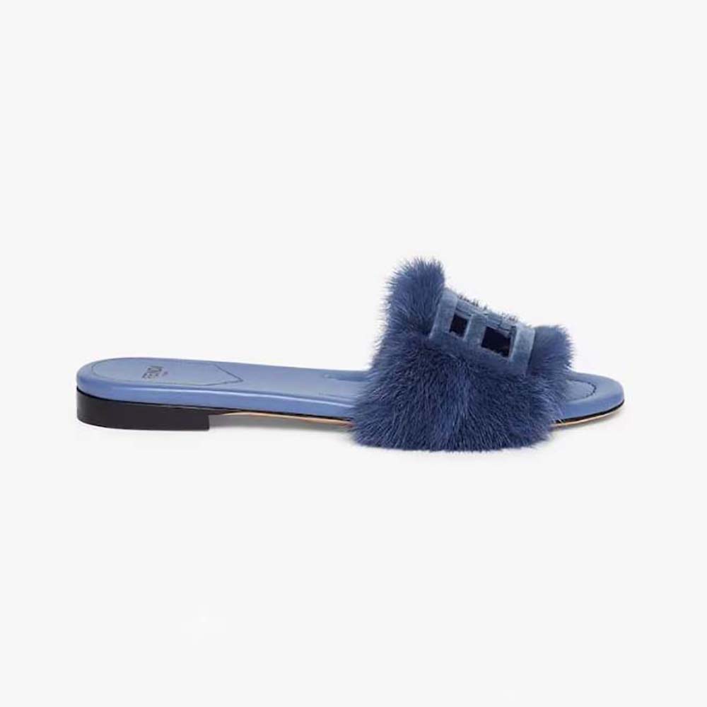 Side view of Fendi Women Baguette Blue Mink Slides showing plush texture