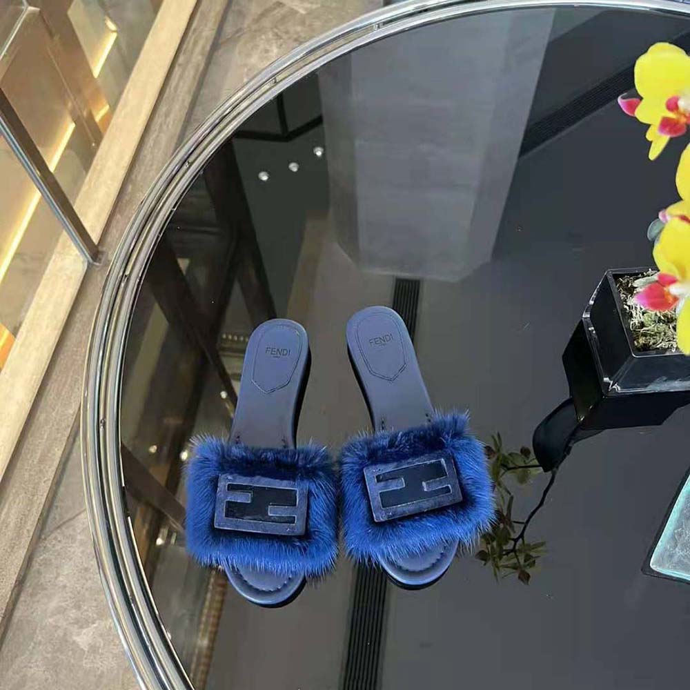 Top view of Fendi Women Baguette Blue Mink Slides highlighting open-toe design
