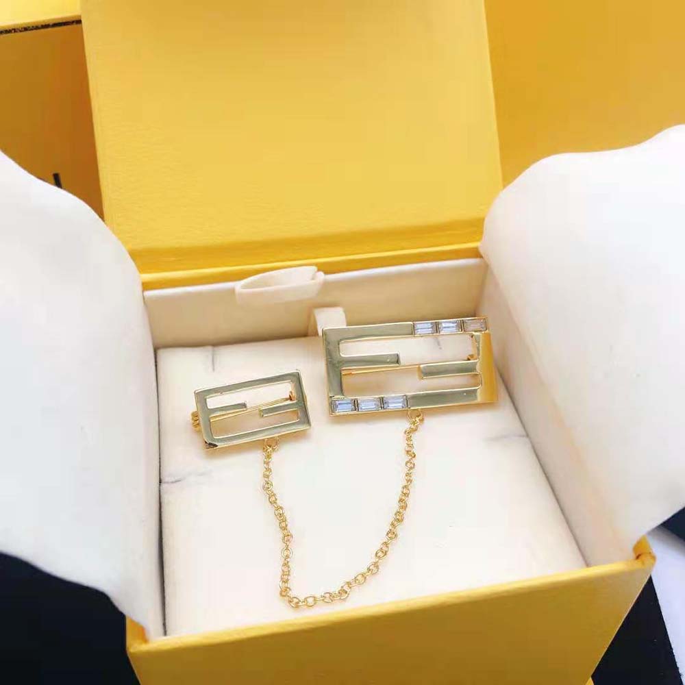 Side angle showing pin closure on Fendi Women Baguette Brooch Gold Coloured