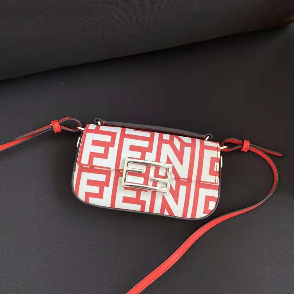 Close-up of gold-tone hardware on Fendi Women Baguette Lunar New Year Capsule bag