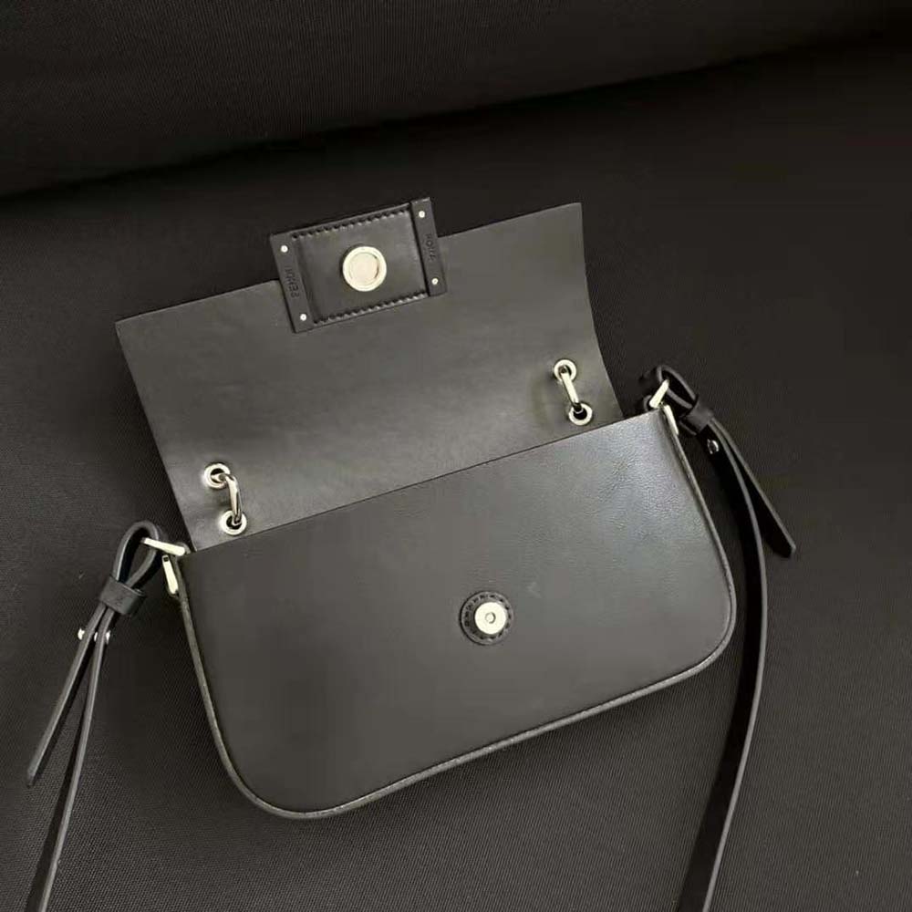 Side profile showing sleek silhouette of Fendi Women Baguette Phone Pouch