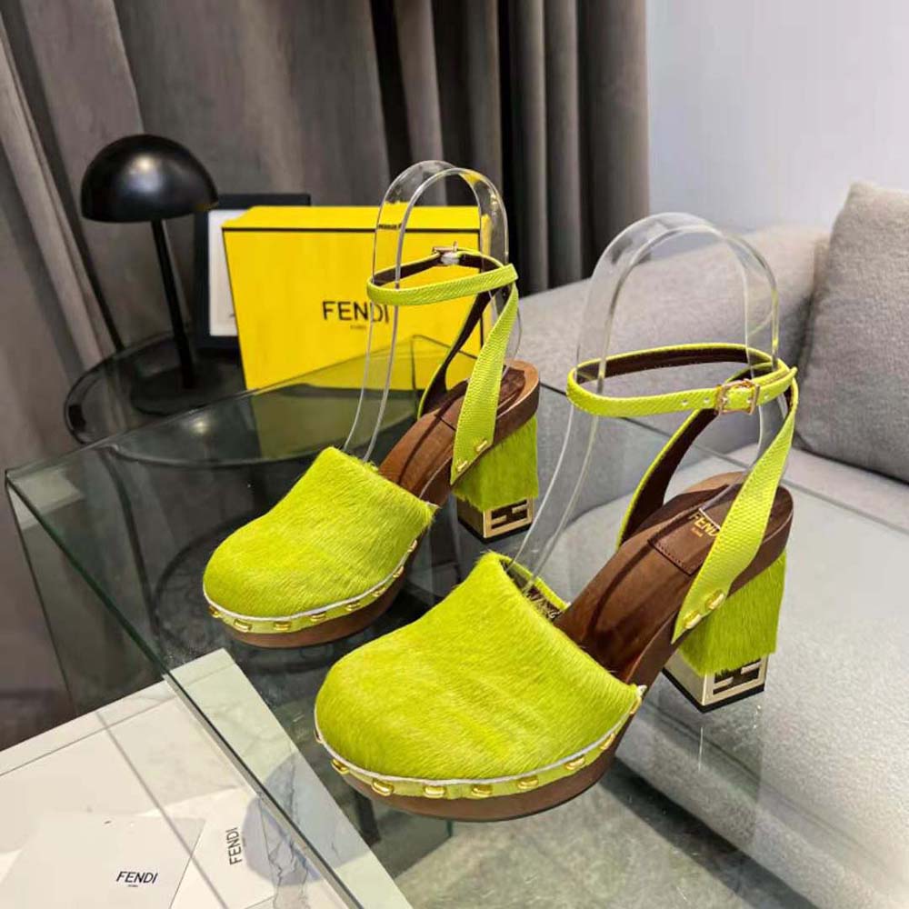 Rear angle showing heel height and open-back design of Fendi high-heeled clogs