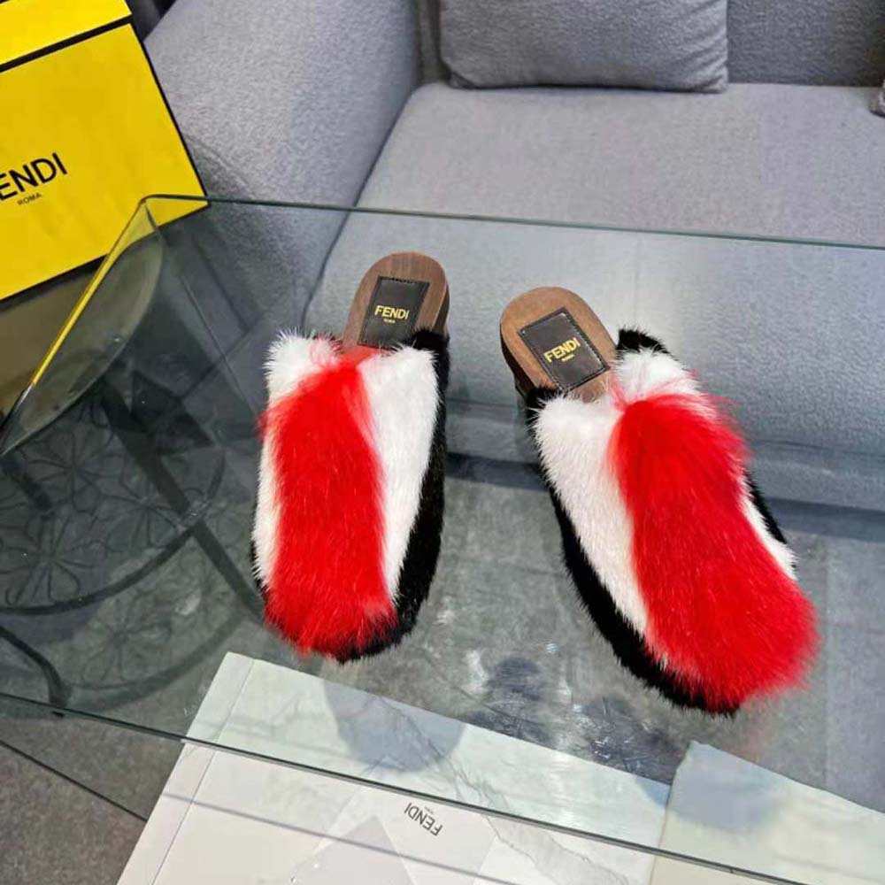 Rear angle showing medium heel on Fendi Women Baguette Show clogs