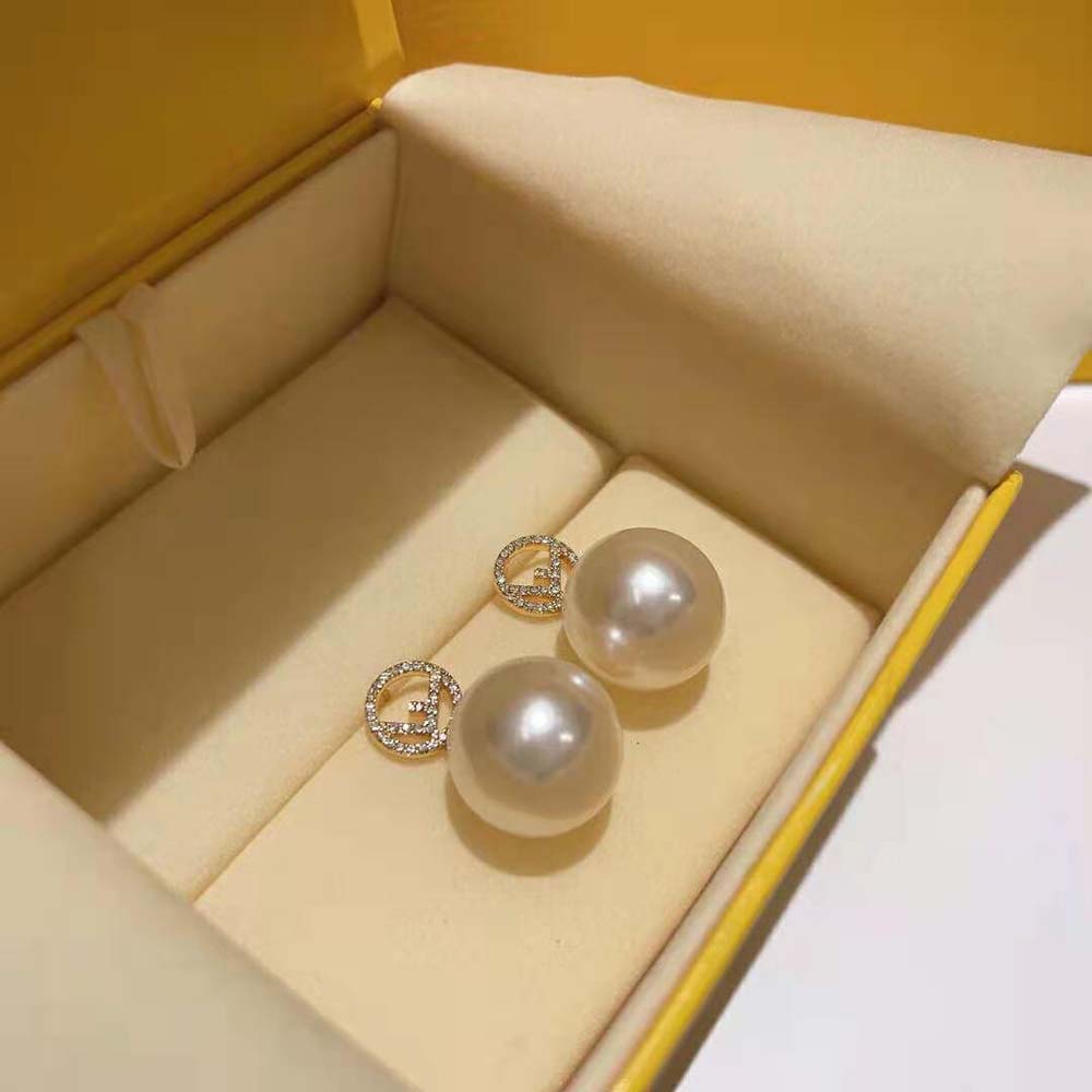 Side view of Fendi Women F Is Fendi Earrings Gold with post back