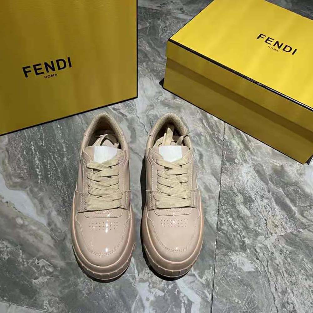 Close-up of pink leather and signature Fendi hardware detail