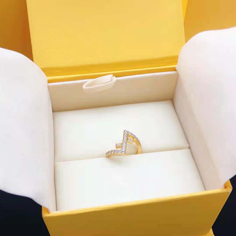 Side angle showing Fendi logo detail on gold-coloured ring