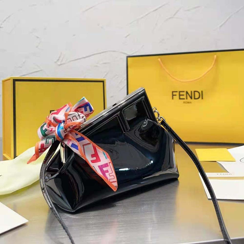 Close-up of gold-tone FF hardware on Fendi Women First Midi Bag