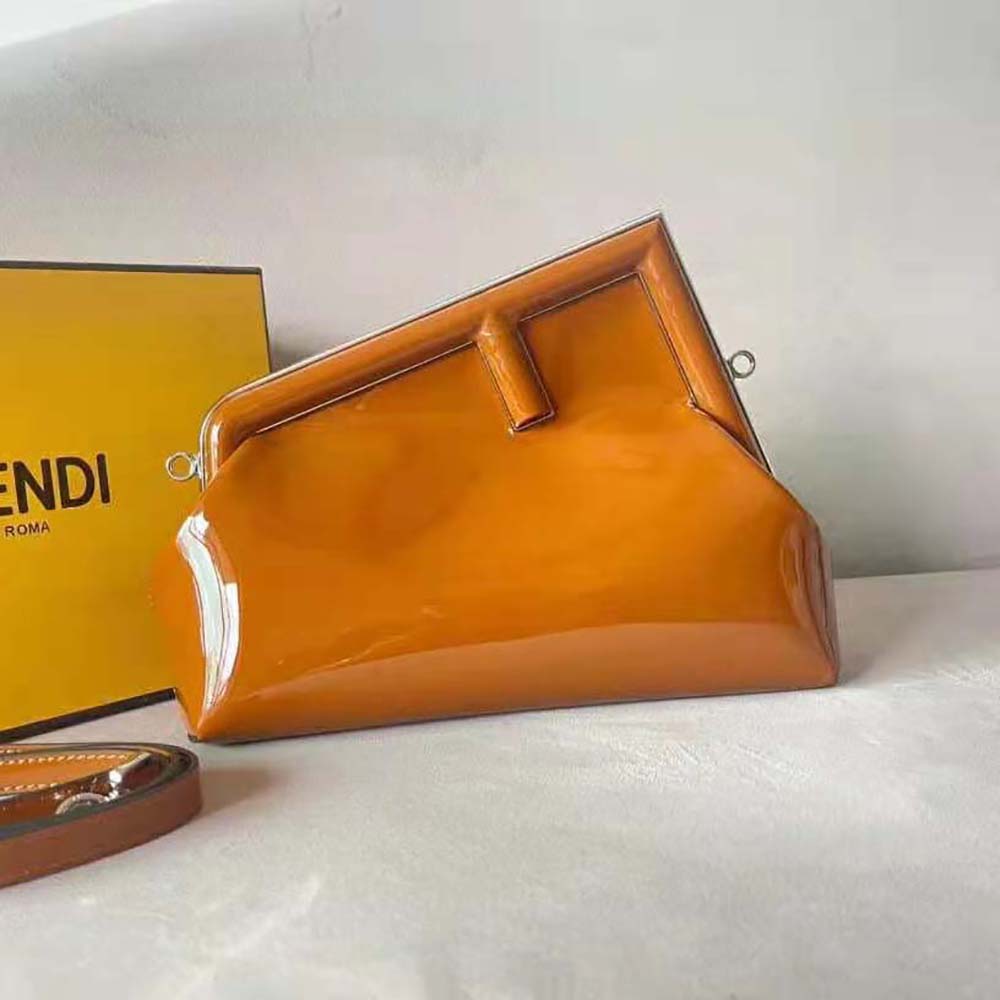 Close-up of glossy patent leather and Fendi logo on Women First Midi Bag