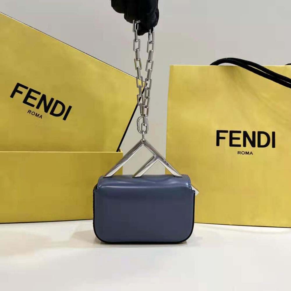 Side angle showing shoulder strap and flap closure on Fendi Women Nano Bag