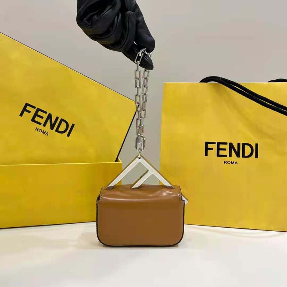 Side angle showing slim profile of Fendi Women Nano Bag F Brown Leather Mini-Bag