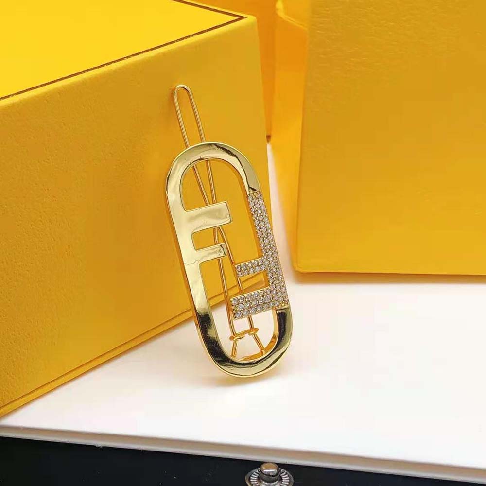 Fendi Women O’Lock Hair Clip Gold-Coloured styled in sleek updo