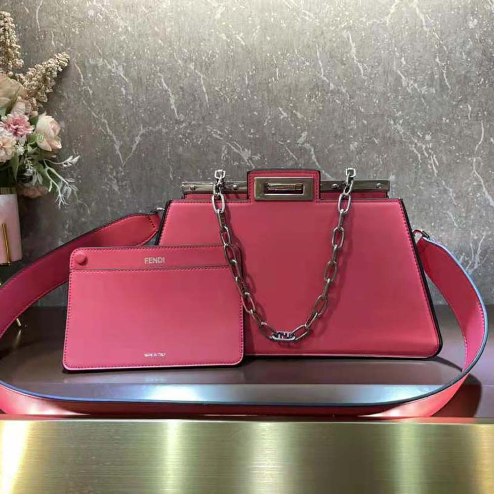 Side angle showing gold hardware on Fendi Peekaboo Cut bag