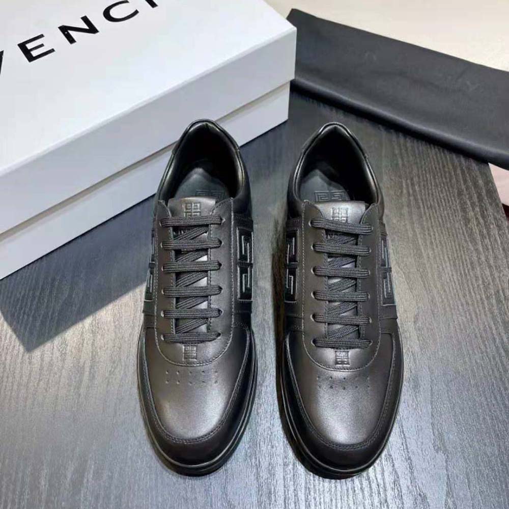 Close-up of leather texture and embossed logo on Givenchy Men G4 Sneakers