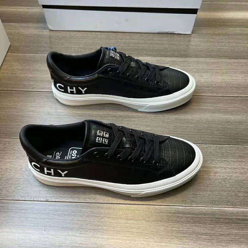 Close-up detail of embossed Givenchy logo on Oswald City Sport Sneakers