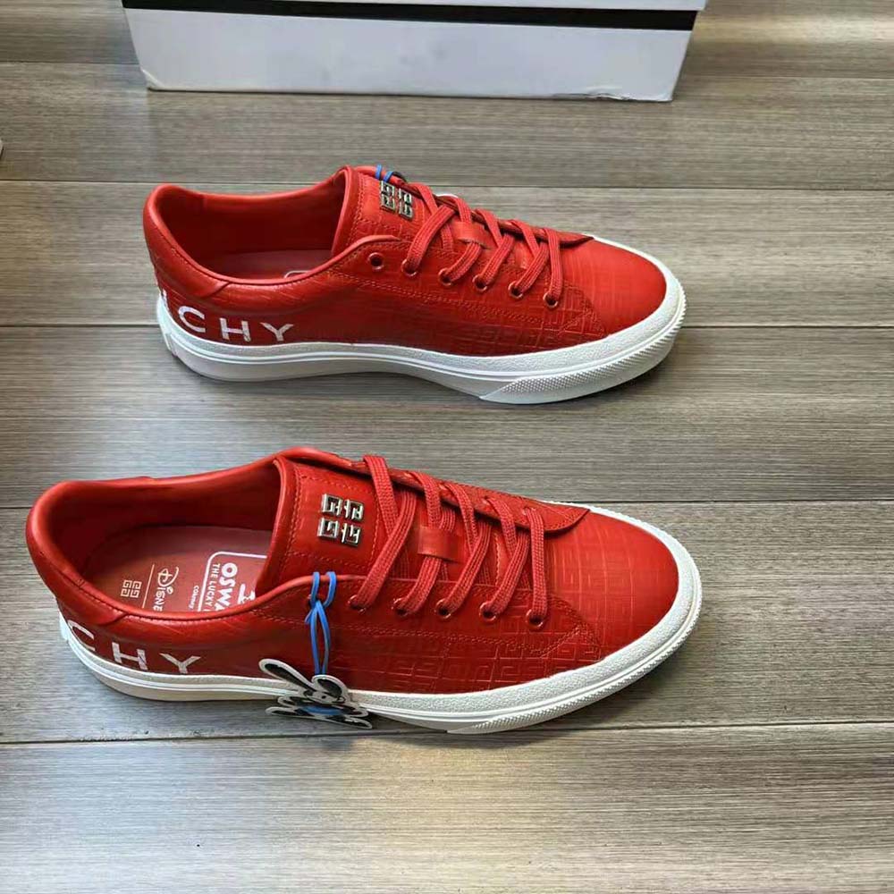 Close-up on red leather and Givenchy branding detail on sneakers