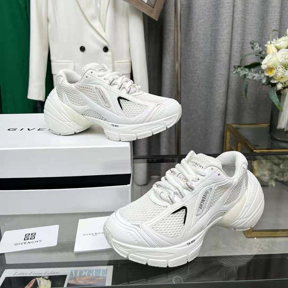 Close-up on white mesh material and Givenchy logo hardware details