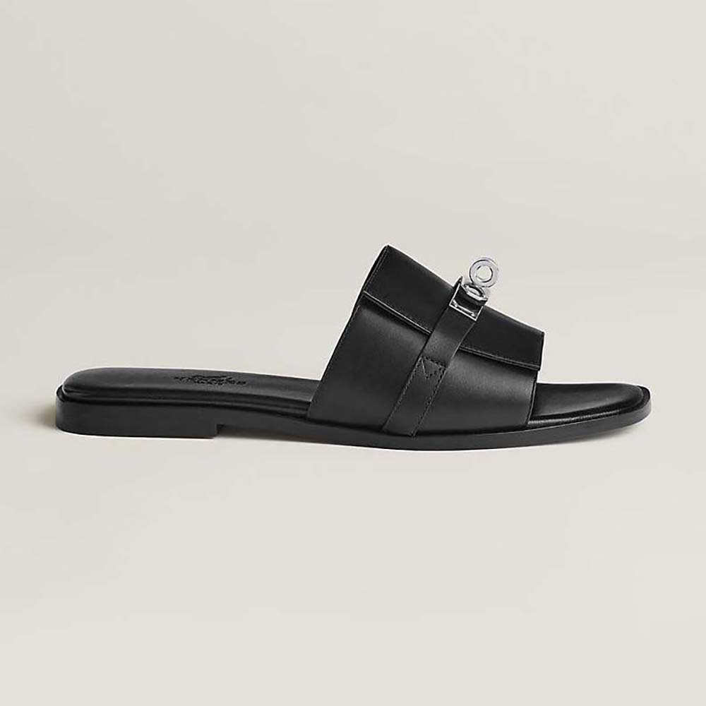Side view of Hermes Women Giulia Sandal in black calfskin with Kelly buckle