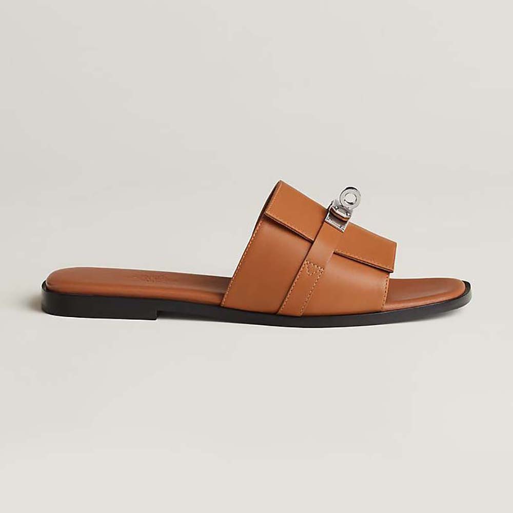 Side profile of Hermes Women Giulia Sandal brown calfskin with Kelly buckle