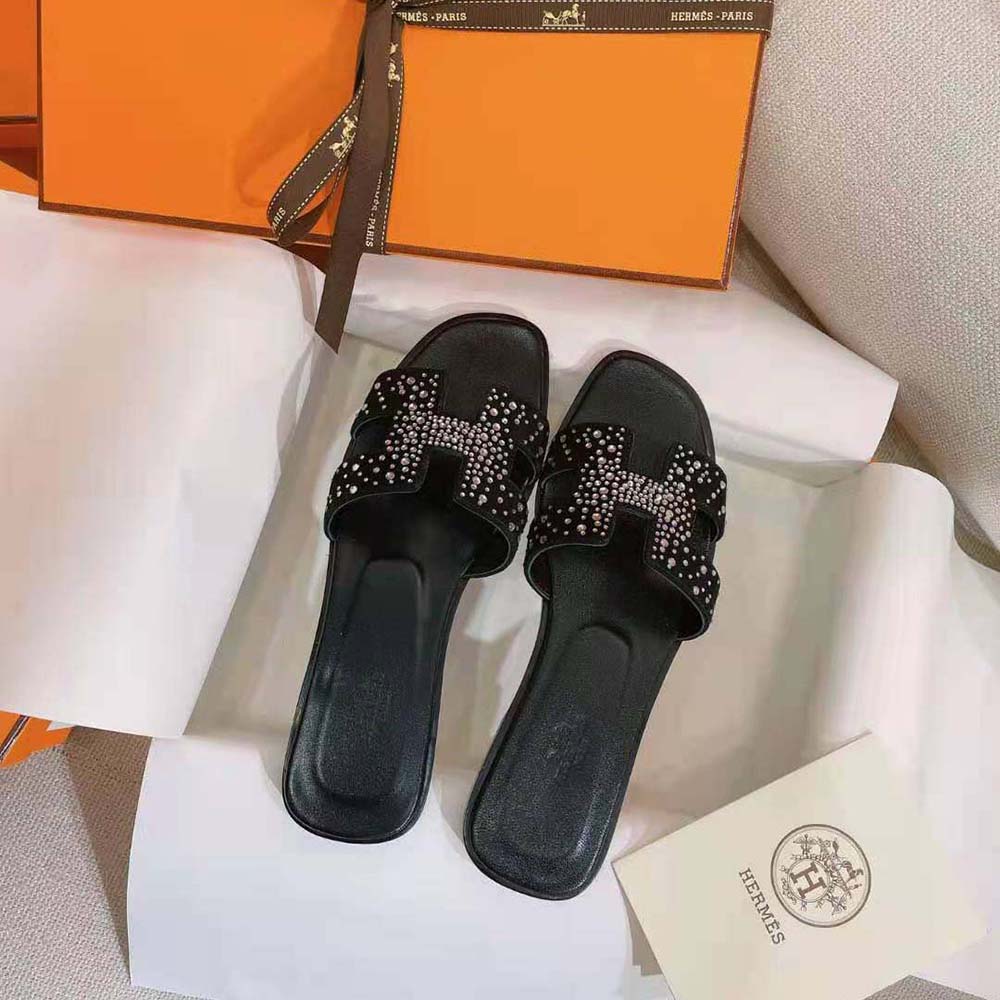 Overhead shot of Hermes Women Oasis Sandal showing buckle detail