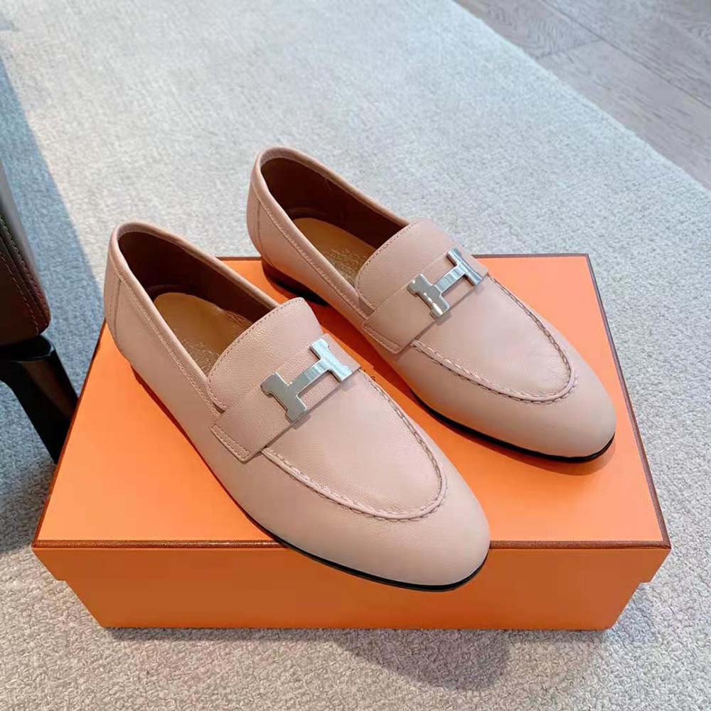 Top-down angle showing classic silhouette of Hermes pink loafer