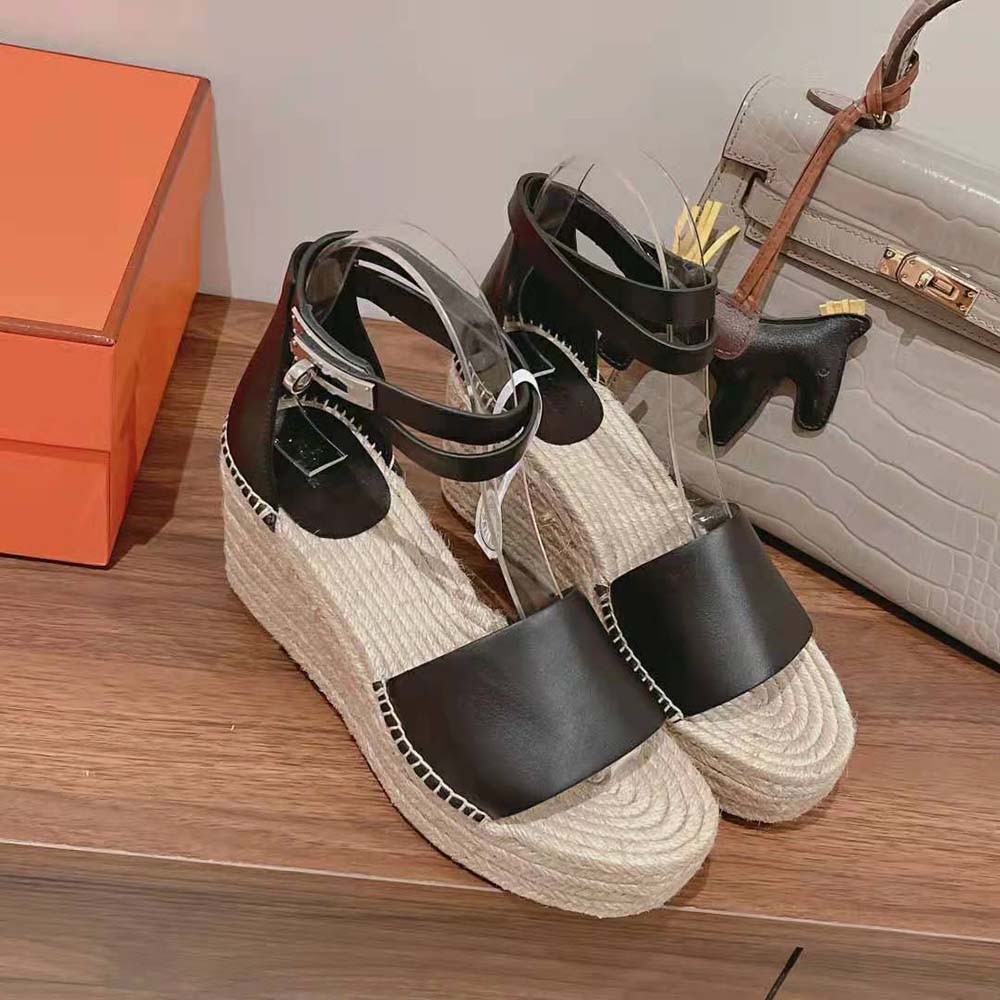 Top view showing elegant black calfskin and espadrille wedge of Hermes Women Tipoli Espadrille
