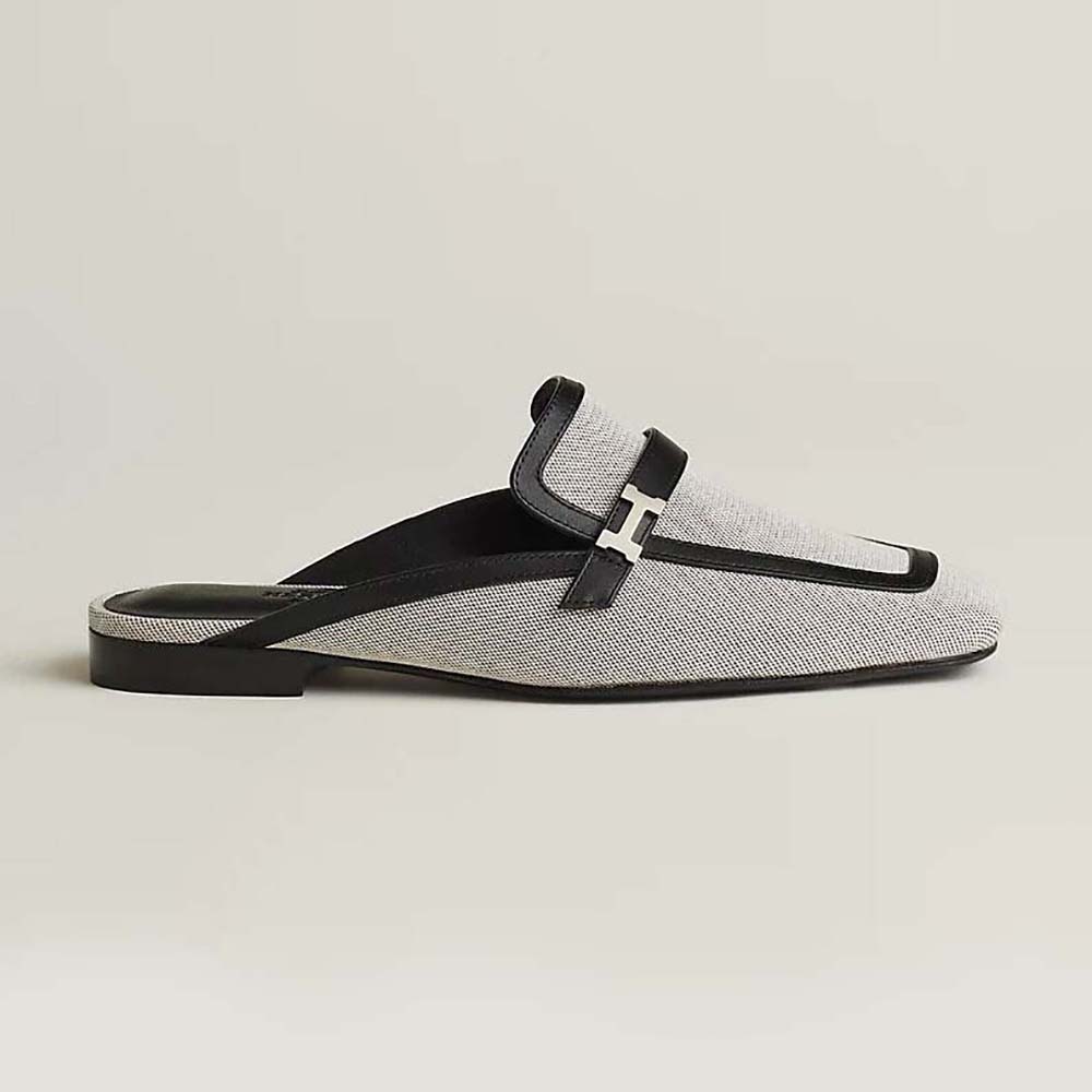 Side view of Hermes Women in H Canvas and Calfskin-Black sandal