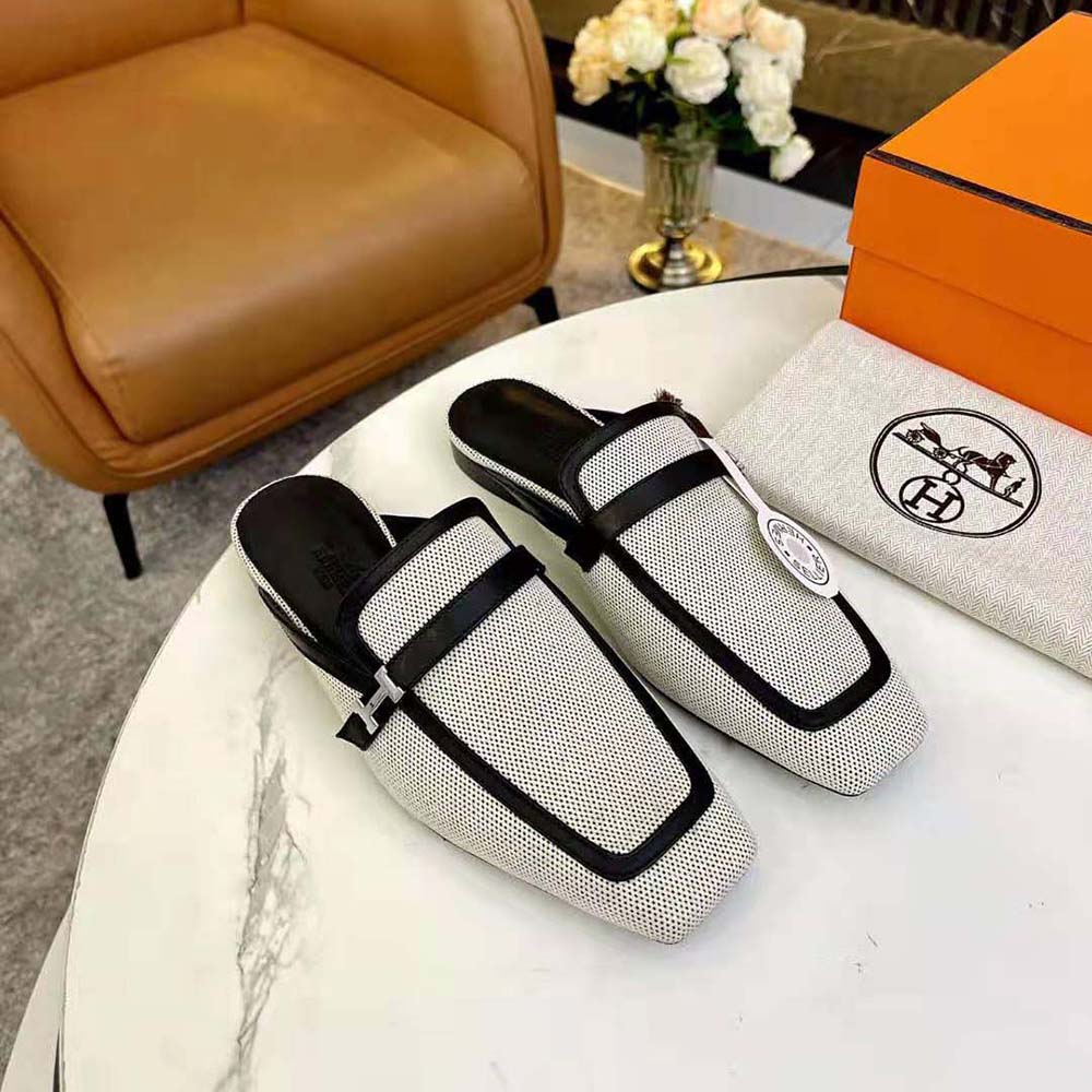 Close-up of signature H hardware on Hermes Women in H Canvas sandal