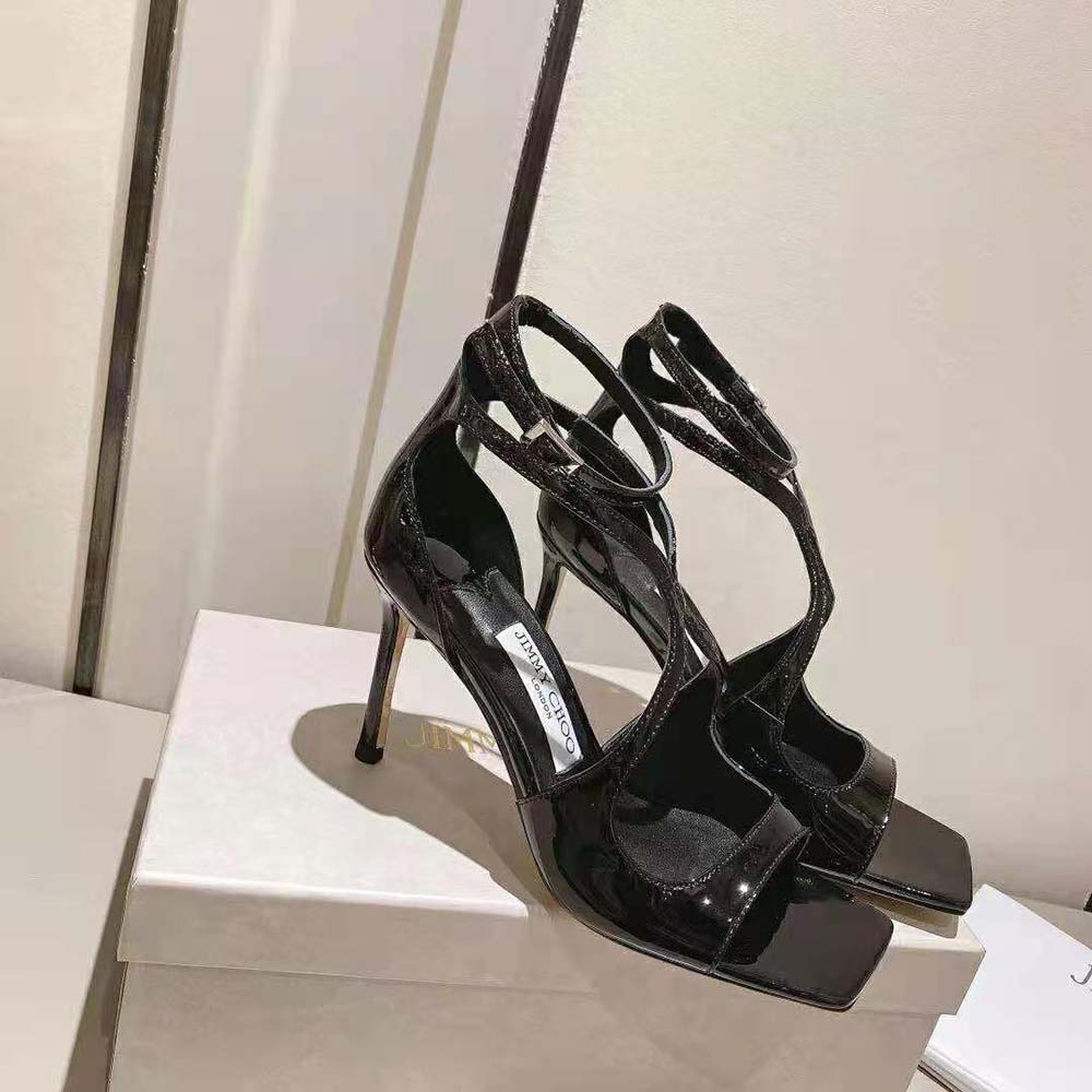 Front angle of Jimmy Choo Women Azia 110 Black Patent Leather Sandals