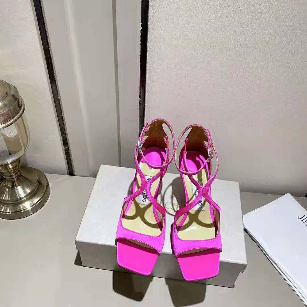 Close-up detail of satin and gold hardware on Jimmy Choo Azia sandals
