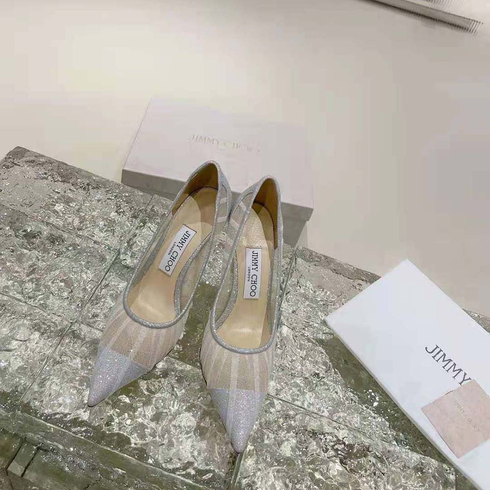 Close-up detail of ivory tulle overlay on Jimmy Choo Love 100 pumps