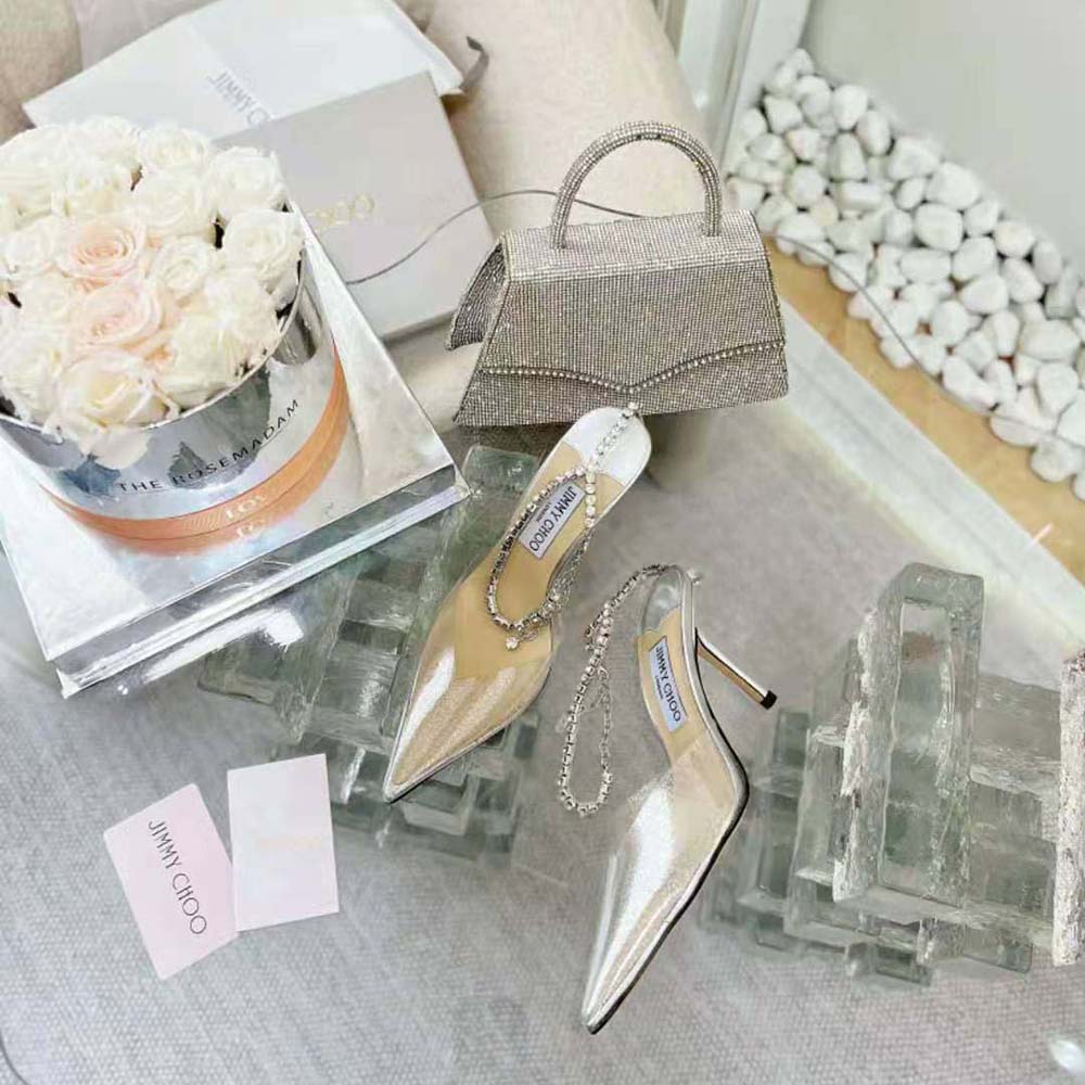 Side view showing plexi panels on Jimmy Choo Women Saeda 100 Silver Glitter Plexi Pumps