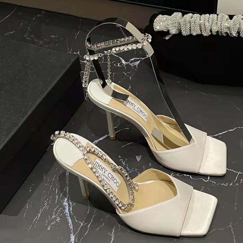 Top view showing ankle strap detail of Jimmy Choo Women Saeda Sandal 100