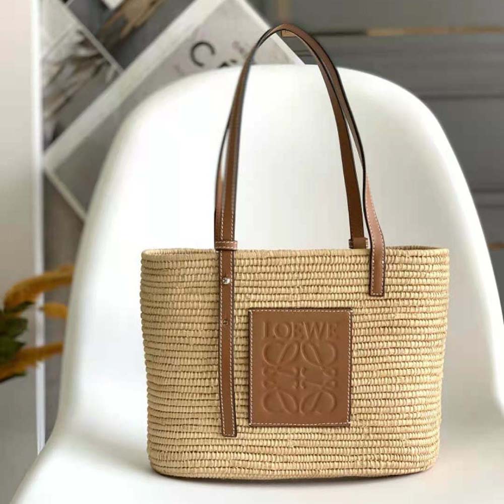 Close-up of gold-tone hardware on Loewe Women Small Square Basket Bag